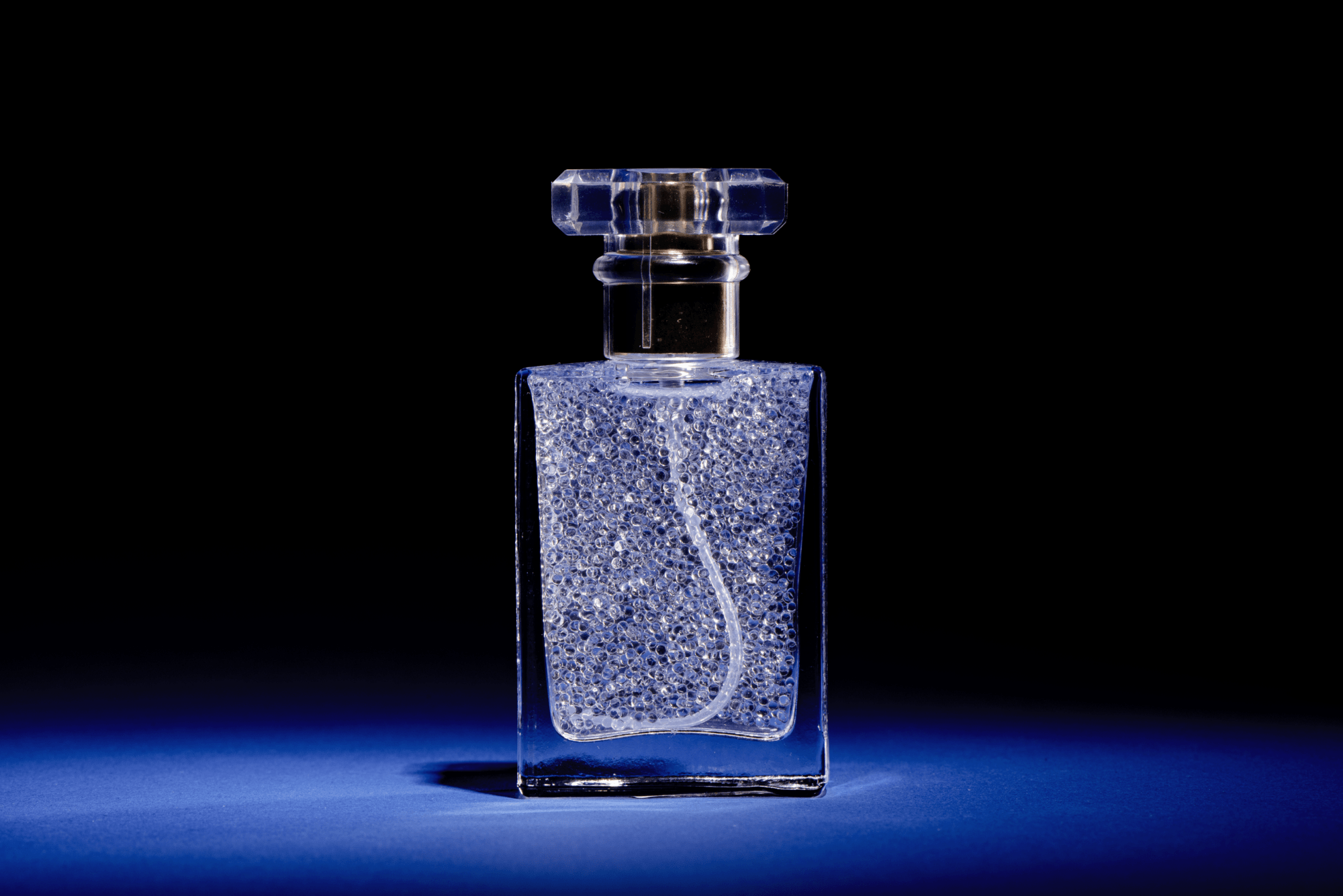 Microcaps Bottle on Background Fine Fragrances
